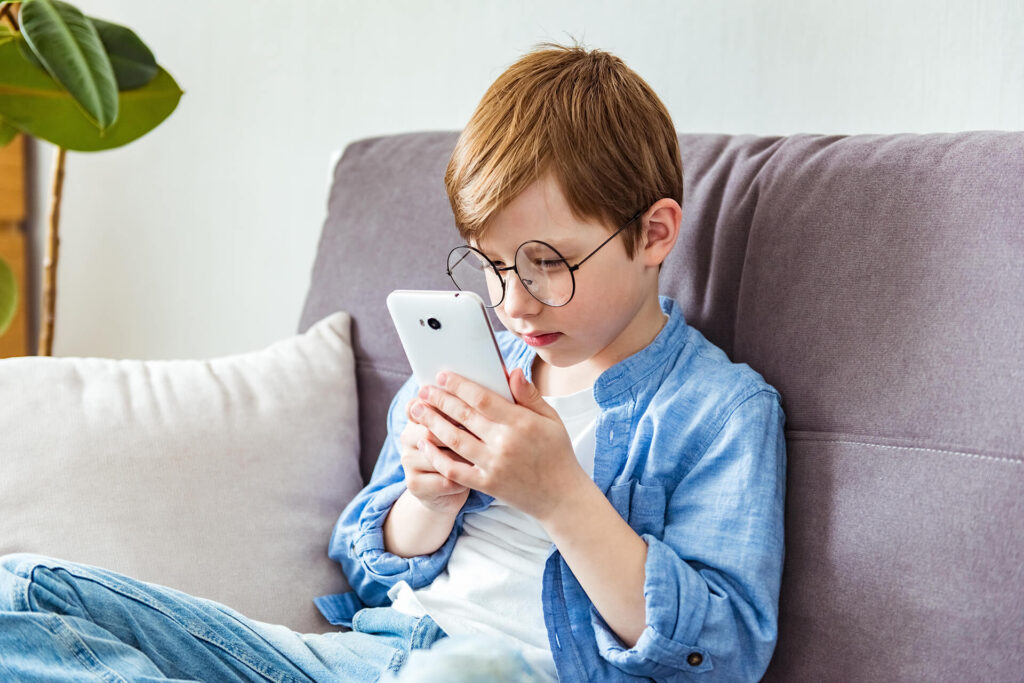 young boy suffering from myopia