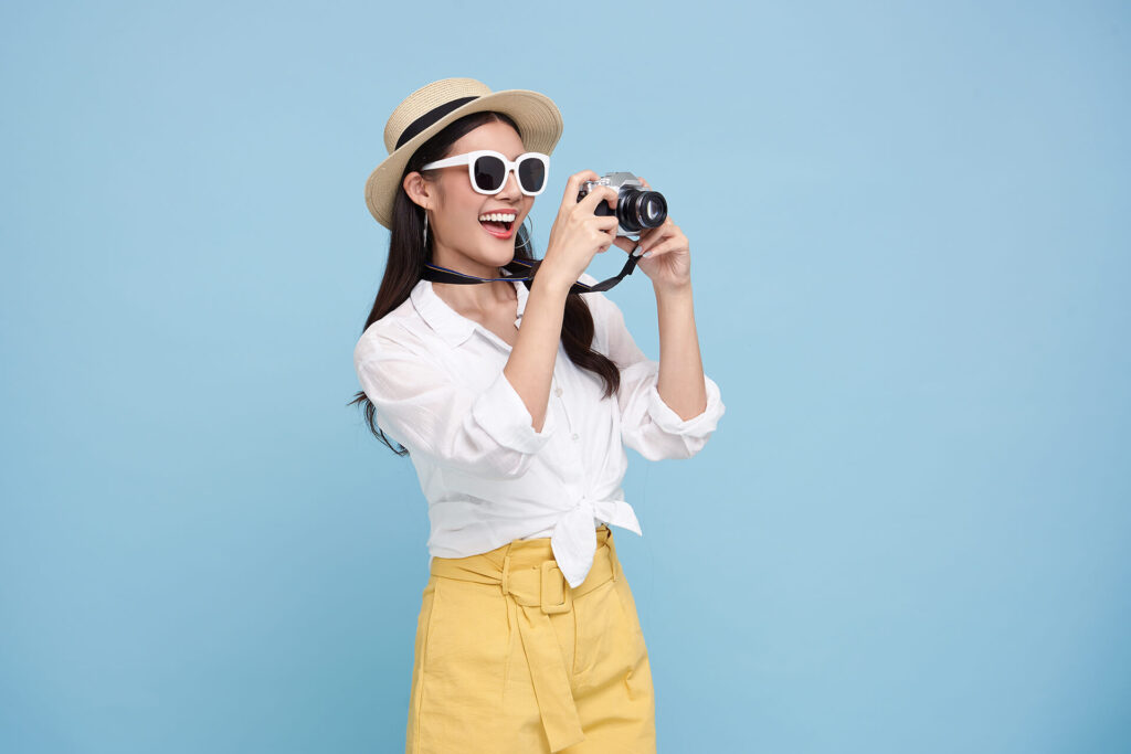 happy woman who can see and take photographs