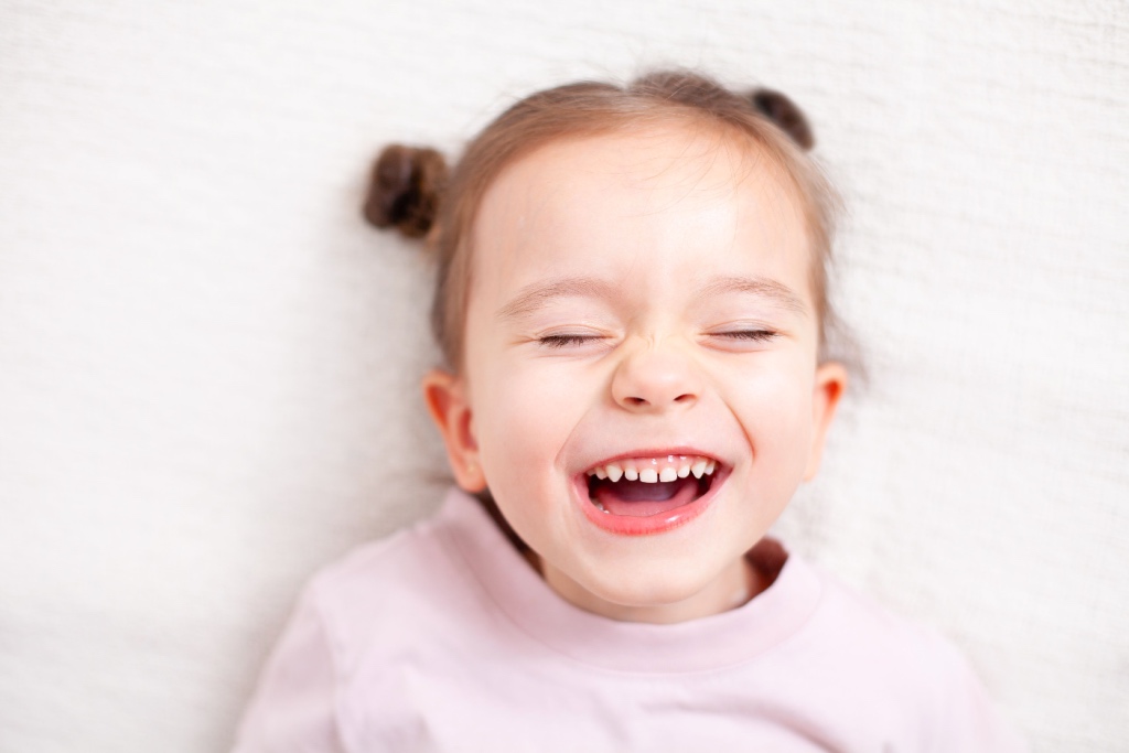 girl with eyes closed
