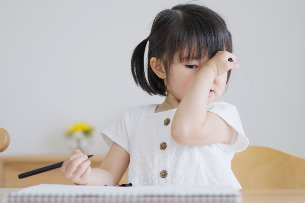young child struggling with vision